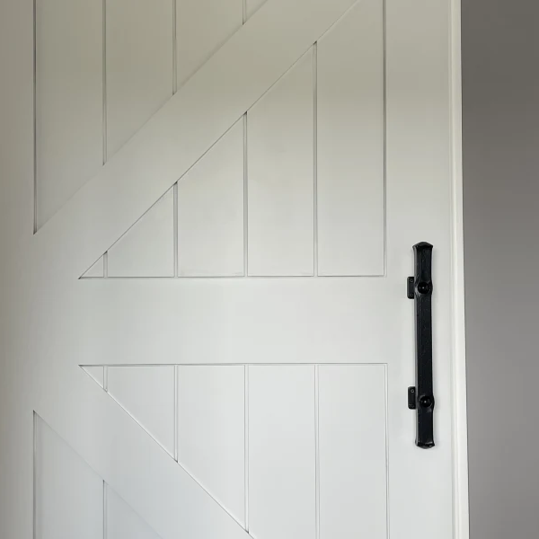 Large barn style white door with long handle