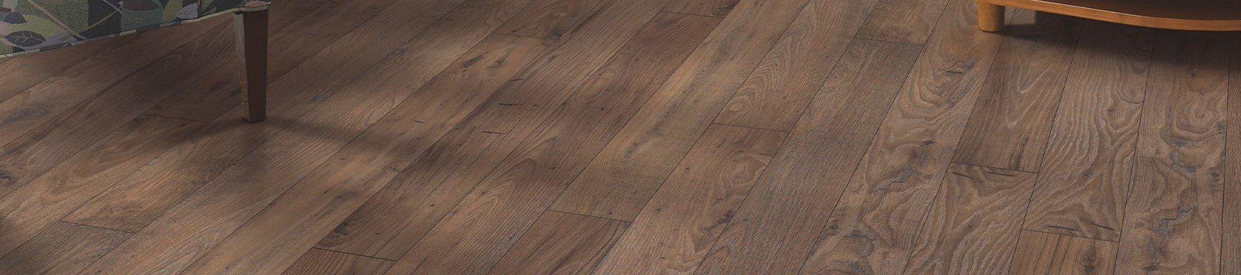 Dark brown laminate floors in a living room.