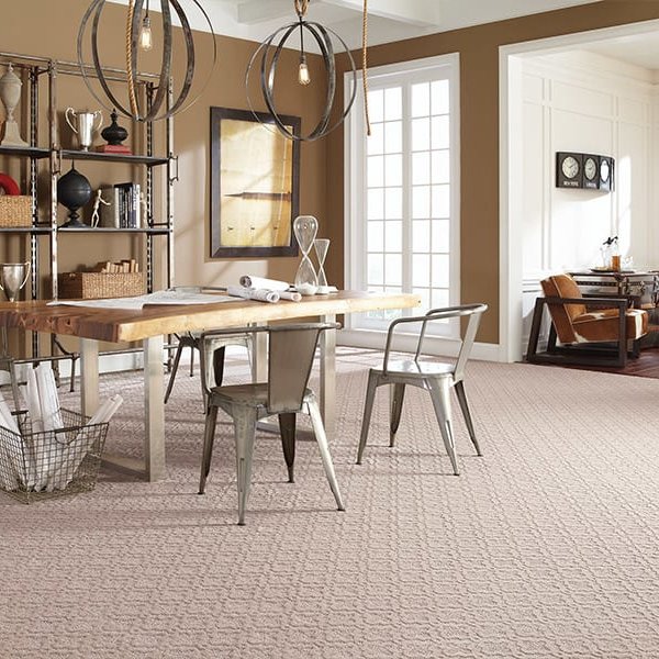 Dining room table and chairs on carpet